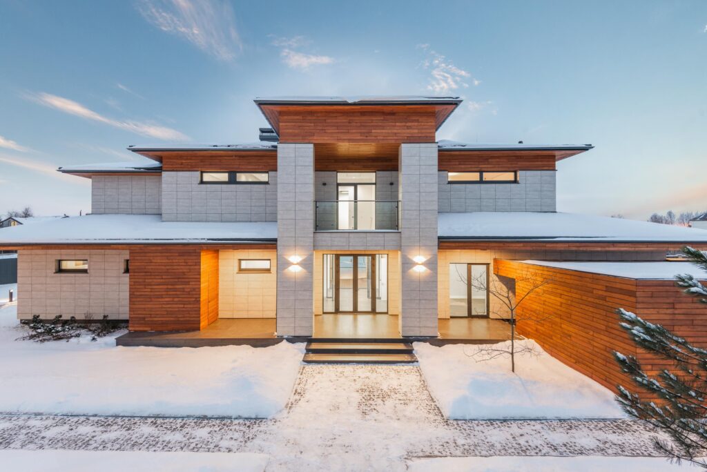 Contemporary house facade covered in snow during winter